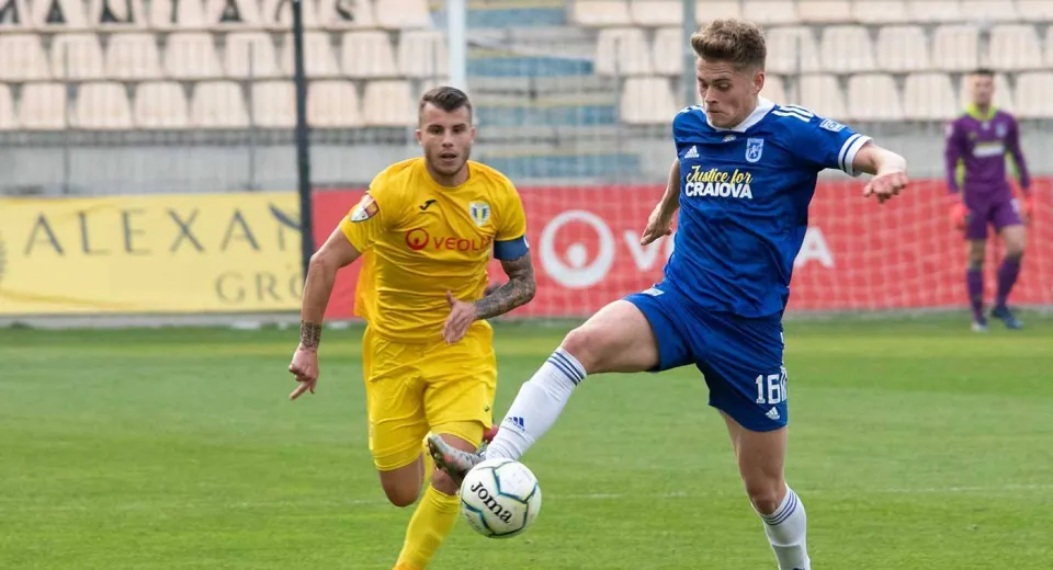 Foto Foștii jucători ai lui FCU s-au transferat în străinătate. Cu cine au semnat Vlad Pop și Andrei Dragu